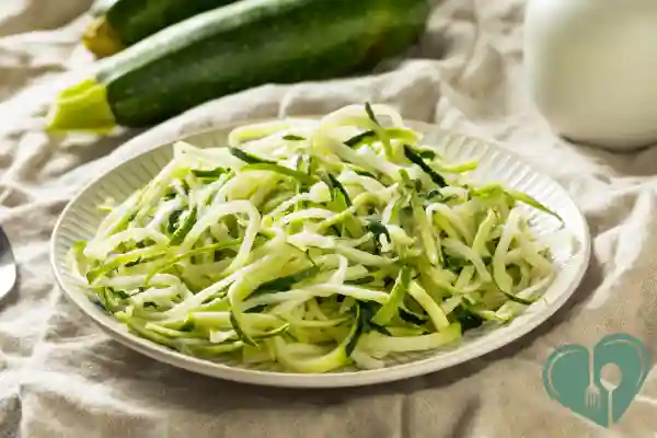 Fresh zucchini noodles (zoodles) on a plate