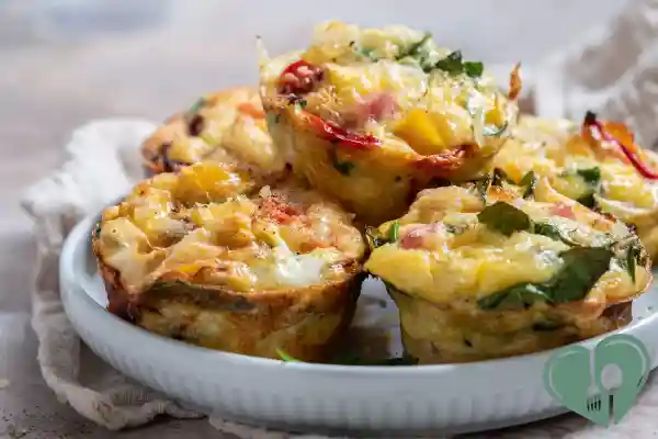 Baked egg muffins with spinach, bell peppers, and turkey sausage