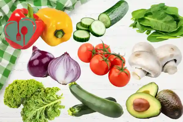 Low-carb vegetables for diabetic breakfast including spinach, bell peppers, zucchini, mushrooms, tomatoes, cucumbers, onions, kale, and avocado